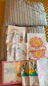 lot 219 image: Two Vintage Feather Pillows and Hand Crocheted Pillowcases