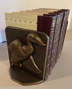 lot 165 image: Brass Duck Bookends and Six Books