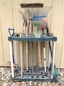 lot 80 image: Yard Tool Organizer with Shovels, Rakes. Pitch Fork