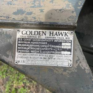 lot 99 image: Golden Hawk Canoe