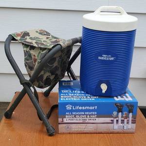 lot 274 image: All Season 4-Post Heated Boot, Glove and Hat Electric Dryer NIB, Camo Folding Stool and 2-Gal Drink Cooler