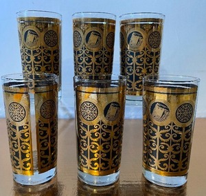 lot 41 image: MCM Libbey Low Ball Glasses Black and Gold Prudential Insurance The Rock