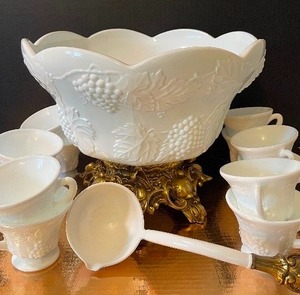 lot 134 image: Antique Lancaster Color Co. Milkglass Punch Bowl on Gold Pedestal with 12 cups