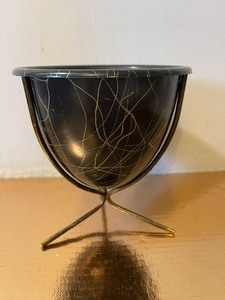 lot 156 image: Small MCM Bullet Planter Black and Gold and Tripod Stand
