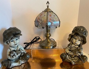 lot 312 image: Vintage Pottery Class Boy and Girl Figure and Butterfly Shade Lamp
