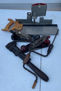 lot 219 image: Vintage hand Tool LOT Two Wood Planes, Mitre Saw with Box, Pipe Wrench and Hand Drill