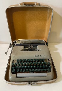lot 345 image: Vintage Smith Corona Sterling Typewriter and Carrying Case