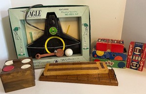 lot 443 image: Vintage Eagle 19th Electric Putting Cup Game Cribbage Board and Poker Chips
