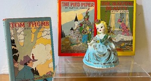 lot 514 image: Southern Belle Vintage Planter and Three Vintage Story Books