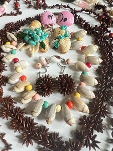 lot 166 image: Vintage Hawaiian Necklace Lot Shells, Koa Seeds, Elephant Ears and More