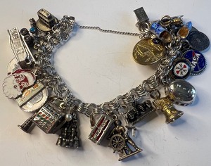 lot 538 image: Vintage Charm Bracelet with Sterling Silver Charms