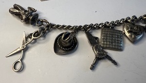 lot 541 image: Vintage Charm Bracelet with Sterling Silver Charms and Extra Charms