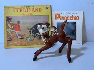 lot 489 image: Vintage Walt Disney Ferdinand the Bull Book, Pinocchio and Ceramic Deer