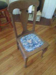 lot 43 image: Antique Wooden dining chair with well loved fabric covered seat and nail head