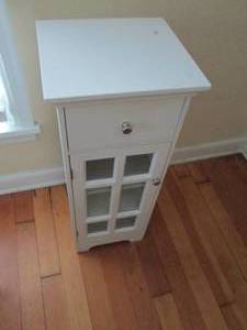 lot 47 image: White painted space saver cabinet with single drawer and 6-pane glass front door