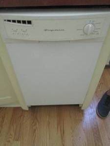 lot 70 image: Frigidaire Compact size Dishwasher with stainless steel interior buyer responsible to bring proper tools and remove from structure
