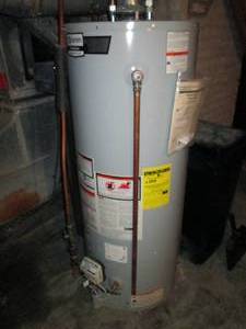 lot 83 image: Relatively newer AO Smith 48-gallon natural gas water heaterbuyer responsible to bring proper tools and knowledge to remove from structure - this is plumbed into the house and full of water.