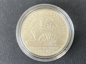 lot 23 image: 2000-P Library of Congress Silver Dollar