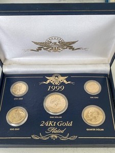 lot 32 image: 1999 24K Gold Plated Coin Set