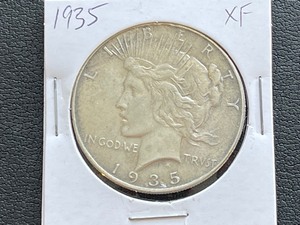 lot 63 image: 1935 Peace Dollar XF