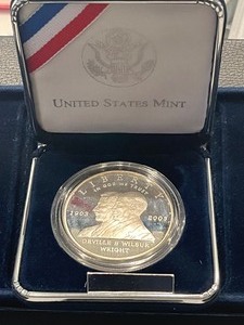 lot 156 image: 2003-P First Flight Silver Dollar Proof 53,761 Minted