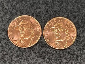lot 191 image: (2) 1 Ounce .999 Fine Copper Donald Trump Rounds