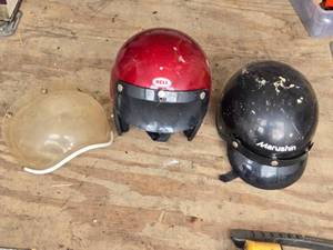 lot 33 image: Pair of Old Helmets