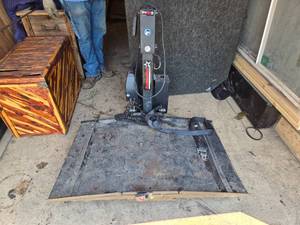 lot 88 image: Wheel Chair Lift - Untested - Battery Operated, Appears it Can Also Plug Into Cig Lighter