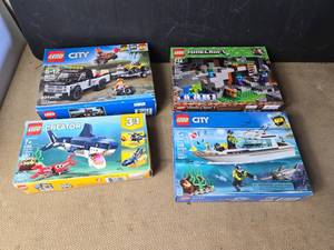 lot 127 image: 4 Lego Sets That Have Been Opened and Used - Do Not Appear to be Complete