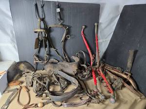 lot 215 image: Vintage Saddle Parts, Horse Blinders, Yoke Harness and More