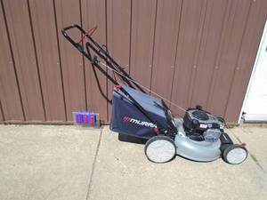Murray push mower with bagger. Looks nearly new. Tested & works. As shown.