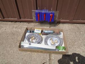 Flat with water heater componenets & braided water lines. As shown.