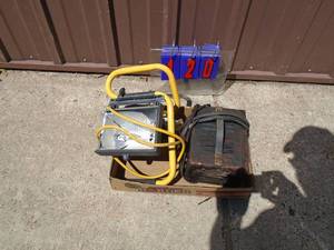 Vintage battery charger & work light. As shown.