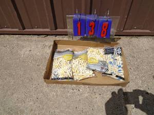 Flat of golf tees. As shown.