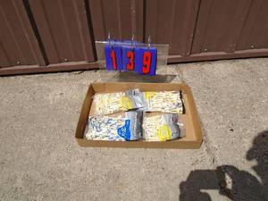 Flat of golf tees. As shown.