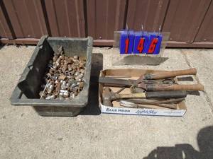 Boc of assorted lug nuts & assorted tools. As shown.