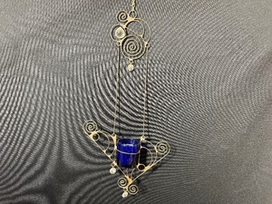 lot 57 image: Unique Hanging Candle Holder