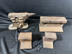 lot 109 image: Three Railroad Ties and an Anvil