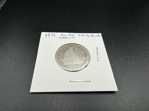 lot 13 image: 1875 Seated Liberty Quarter