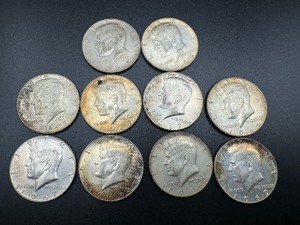 lot 18 image: Ten 40% Silver Kennedy Half Dollars