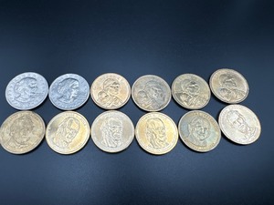 lot 22 image: Twelve Dollar Coins Six Presidential, Four Sacagawea, Two Susan B. Anthony