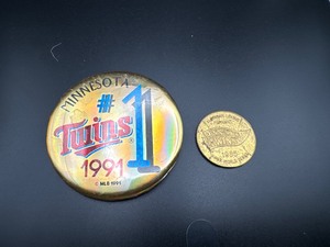 lot 37 image: Minnesota Twins Token and 1991 World Series Button
