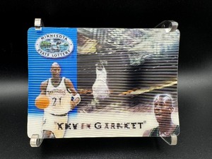 lot 44 image: Minnesota Timberwolves 1999-200 Schedule featuring Kevin Garnett with Plastic Display Stand