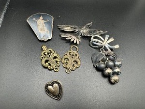 lot 261 image: Vintage Jewelry - 1940s Siam Sterling Silver Clip Thai Dance, Metal Heart and More Interesting Pieces