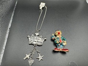 lot 268 image: Color Vintage Hobo Clown Brooch and Queen of the Road Car Charm