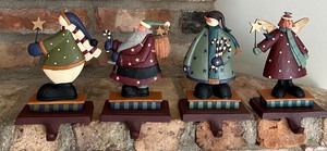 lot 87 image: Set of 4 Painted Cast Iron Christmas Stocking Holders #2