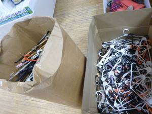 2 Boxes of Plastic Hangers