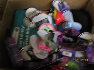 box of in date candy, briefs and toys