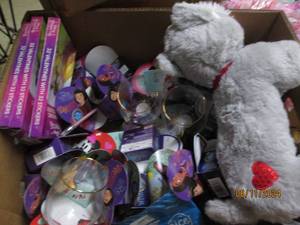 box of in date candy , stuffed animal and more