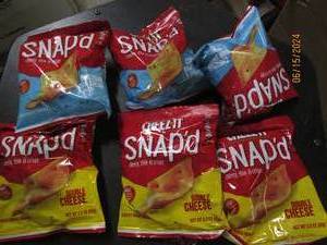 lot of 62.20z shaped baked snacks